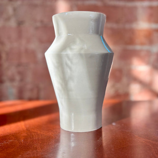 Angular white porcelain vase with a clear shiny finish. Made by Hillit Wahlberg
