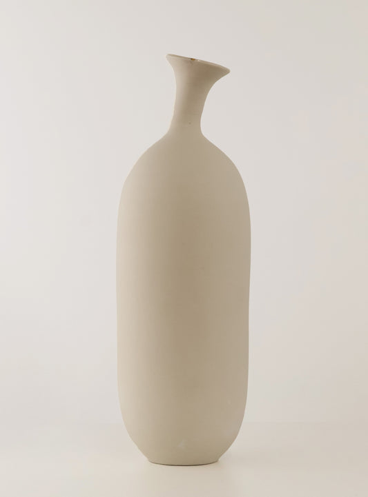 A minimalist, matte ceramic vase with a unique flared neck and rounded body, shown against a plain light gray studio background.